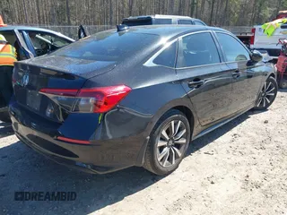2023 Honda Civic Sedan EX with VIN 2HGFE1F70PH306371, listed as a IAAI auction lot 41811181 with 79,696 mi miles. Bid and sale history available at carsss.com. Image 2.