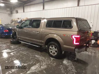 2015 Ford F-150 XLT with VIN 1FTEW1EG8FKD90178, listed as a IAAI auction lot 41163598 with 183,308 mi miles. Bid and sale history available at carsss.com. Image 3.