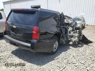 2019 Chevrolet Suburban LT with VIN 1GNSKHKC6KR202548, listed as a Copart auction lot 60195714 with 156,087 mi miles and Salvage Title. Bid and sale history available at DreamBid. Image 3.