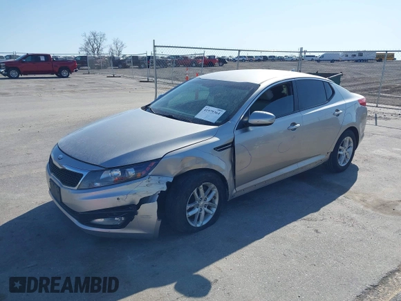 2013 Kia Optima LX with VIN KNAGM4A73D5356339, listed as a IAAI auction lot 41979364 with 140,000 mi miles. Bid and sale history available at carsss.com. Image 2.