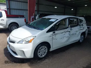2014 Toyota Prius Two with VIN JTDZN3EU7EJ013979, listed as a IAAI auction lot 42105528 with 203,589 mi miles and . Bid and sale history available at DreamBid. Image 6.
