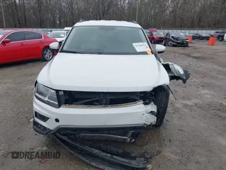 2020 Volkswagen Tiguan SE with VIN 3VV3B7AX2LM055418, listed as a IAAI auction lot 41248422 with Not Provided miles and . Bid and sale history available at DreamBid. Image 11.