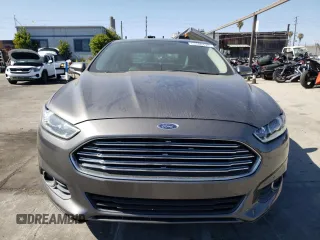 2013 Ford Fusion SE Hybrid z VIN 3FA6P0LUXDR362711, wystawiony jako Copart lot #57060425 z przebiegiem 155 031 mil mil oraz Szkoda całkowita • Salvage title. Historia ofert i sprzedaży dostępna na DreamBid. Obrazek 5.