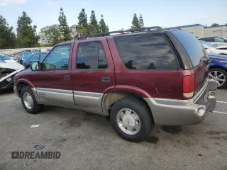 2000 GMC Jimmy SL with VIN 1GKCS13WXY2180539, listed as a Copart auction lot 89411665 with 167,674 mi miles and Salvage Title. Bid and sale history available at carsss.com. Image 2.