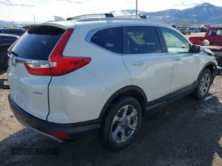 2019 Honda CR-V EX-L with VIN JHLRW2H81KX006771, listed as a IAAI auction lot 41670636 with 82,848 mi miles. Bid and sale history available at carsss.com. Image 4.