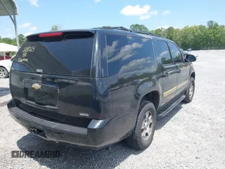 2007 Chevrolet Suburban LT z VIN 1GNFC160X7R218023, wystawiony jako IAAI lot #42305941 z przebiegiem 237 987 mil mil oraz . Historia ofert i sprzedaży dostępna na DreamBid. Obrazek 4.