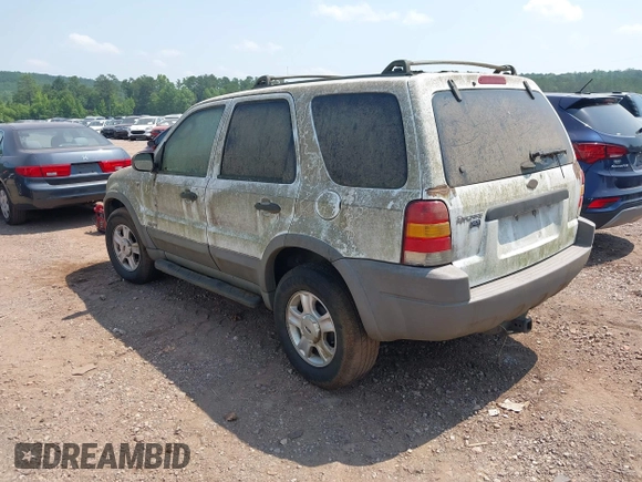 2002 Ford Escape XLT Choice with VIN 1FMYU03122KE08742, listed as a IAAI auction lot 42363962 with 299,455 mi miles and . Bid and sale history available at DreamBid. Image 3.