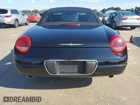 2002 Ford Thunderbird Hardtop Premium z VIN 1FAHP60A52Y122437, wystawiony jako Copart lot #73883244 z przebiegiem Nie podano mil oraz Nie do naprawy • Non repairable. Historia ofert i sprzedaży dostępna na DreamBid. Obrazek 6.