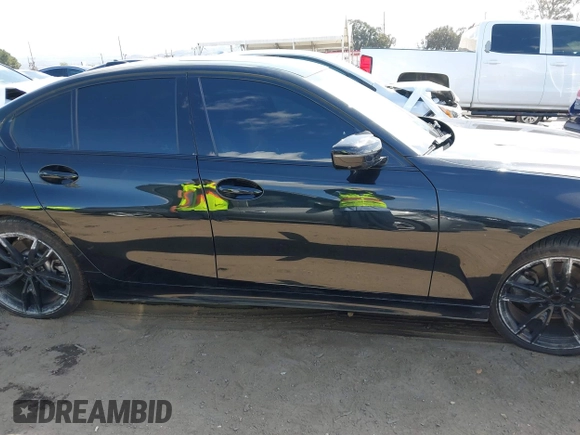 2023 BMW 3 Series 330i with VIN 3MW69FF03P8D45563, listed as a IAAI auction lot 41932536 with 19,496 mi miles and . Bid and sale history available at DreamBid. Image 14.