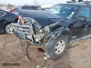 2008 Ford Escape Limited with VIN 1FMCU04168KB67107, listed as a IAAI auction lot 41743038 with 236,171 mi miles. Bid and sale history available at carsss.com. Image 6.