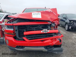 2018 Chevrolet Silverado 1500 LT with VIN 1GCVKREC1JZ370801, listed as a IAAI auction lot 41794974 with 74,510 mi miles. Bid and sale history available at carsss.com. Image 12.