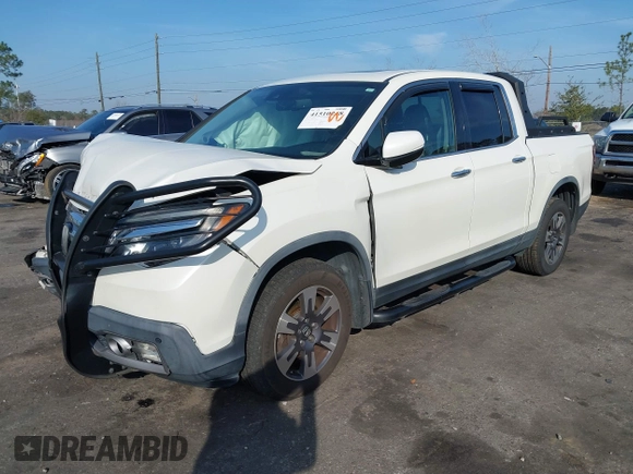 2018 Honda Ridgeline RTL-E with VIN 5FPYK3F71JB001753, listed as a IAAI auction lot 41510248 with 84,551 mi miles and . Bid and sale history available at DreamBid. Image 17.