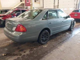 2000 Toyota Avalon XL with VIN 4T1BF28B9YU111753, listed as a IAAI auction lot 41243138 with 113,324 mi miles and . Bid and sale history available at DreamBid. Image 4.