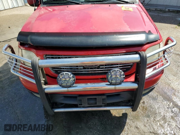 2001 Ford F-150 XL z VIN 2FTRF18W21CA50638, wystawiony jako Copart lot #53474355 z przebiegiem Nie podano mil oraz Nie do naprawy • Non repairable. Historia ofert i sprzedaży dostępna na DreamBid. Obrazek 11.