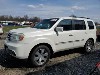 2014 Honda Pilot Touring z VIN 5FNYF4H95EB044628, wystawiony jako Copart lot #52519025 z przebiegiem 117 454 mil mil oraz Szkody całkowita. Historia ofert i sprzedaży dostępna na DreamBid. Obrazek 1.