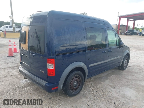 2011 Ford Transit Connect XLT with VIN NM0KS9BN2BT070324, listed as a IAAI auction lot 42511234 with 297,422 mi miles and . Bid and sale history available at DreamBid. Image 4.