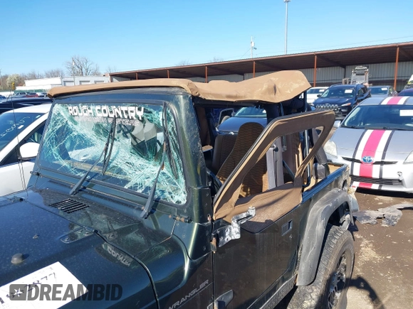 1998 Jeep Wrangler SE with VIN 1J4FY29P6WP709203, listed as a IAAI auction lot 41962877 with 1 mi miles. Bid and sale history available at carsss.com. Image 6.