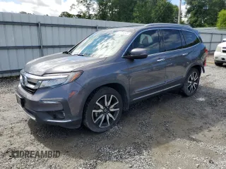 2021 Honda Pilot Touring 8-Passenger with VIN 5FNYF5H92MB037480, listed as a Copart auction lot 55726545 with 52,910 mi miles and Salvage title. Bid and sale history available at DreamBid. Image 1.