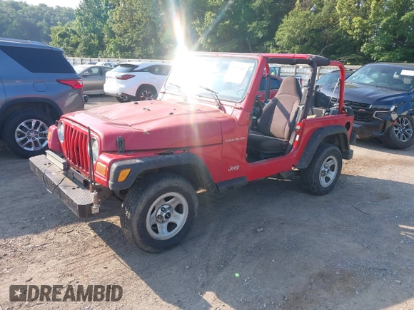 2000 Jeep Wrangler SE with VIN 1J4FA29P6YP775127, listed as a IAAI auction lot 42377387 with Not provided miles and . Bid and sale history available at DreamBid. Image 2.