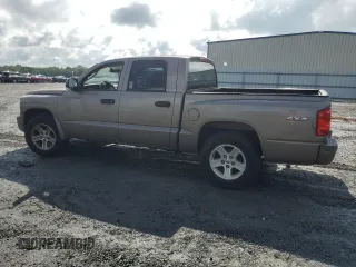2010 Dodge Dakota Bighorn/Lonestar z VIN 1D7RW3GK7AS223579, wystawiony jako Copart lot #61880374 z przebiegiem 102 134 mil mil oraz Czysty tytuł • Clean title. Historia ofert i sprzedaży dostępna na DreamBid. Obrazek 2.