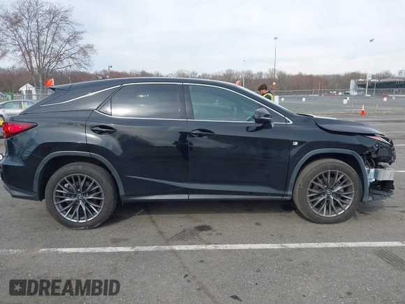 2020 Lexus RX with VIN 2T2SZMDA8LC256854, listed as a IAAI auction lot 41822801 with 74,814 mi miles. Bid and sale history available at carsss.com. Image 13.