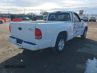 2000 Dodge Dakota SLT with VIN 1B7GL26Z7YS708253, listed as a IAAI auction lot 41402953 with 103,461 mi miles and . Bid and sale history available at DreamBid. Image 4.