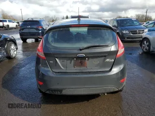 2012 Ford Fiesta SE z VIN 3FADP4EJ4CM183237, wystawiony jako Copart lot #48825605 z przebiegiem 92 798 mil mil oraz Szkoda całkowita • Salvage title. Historia ofert i sprzedaży dostępna na DreamBid. Obrazek 6.