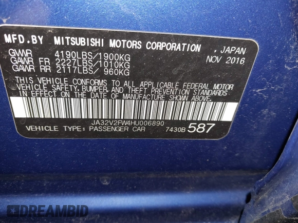 2017 Mitsubishi Lancer ES with VIN JA32V2FW4HU006890, listed as a IAAI auction lot 41636035 with 165,077 mi miles. Bid and sale history available at carsss.com. Image 9.
