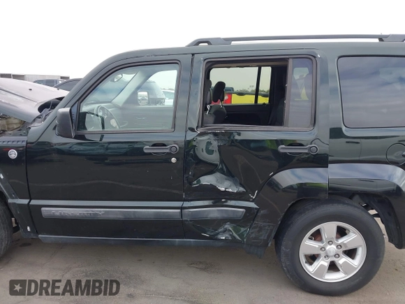 2012 Jeep Liberty Sport with VIN 1C4PJMAK5CW145393, listed as a IAAI auction lot 41558487 with 133,212 mi miles. Bid and sale history available at carsss.com. Image 14.