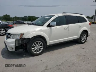 2013 Dodge Journey SXT with VIN 3C4PDCBG2DT547214, listed as a Copart auction lot 60210215 with 151,294 mi miles and Salvage title. Bid and sale history available at DreamBid. Image 1.