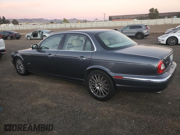 2007 Jaguar XJ with VIN SAJWA71B27SH17096, listed as a Copart auction lot 78863314 with 132,779 mi miles and Salvage Title. Bid and sale history available at carsss.com. Image 2.