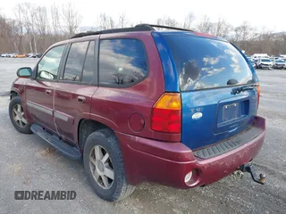 2004 GMC Envoy SLE with VIN 1GKDS13S342287315, listed as a IAAI auction lot 41486715 with 186,129 mi miles. Bid and sale history available at carsss.com. Image 6.