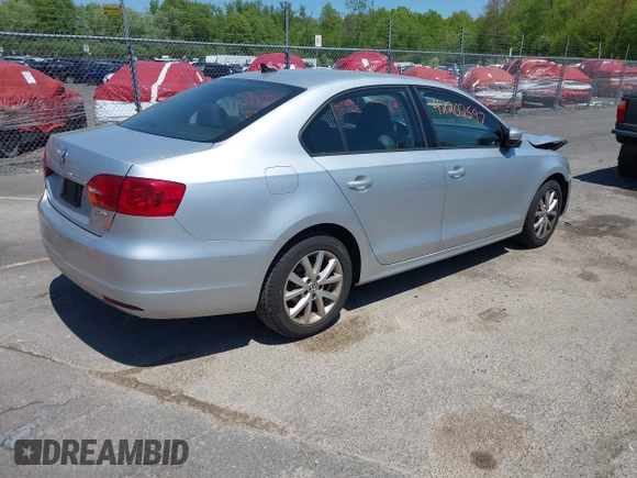 2012 Volkswagen Jetta SE with VIN 3VWDP7AJ8CM465069, listed as a IAAI auction lot 42202597 with 106,963 mi miles and . Bid and sale history available at DreamBid. Image 4.