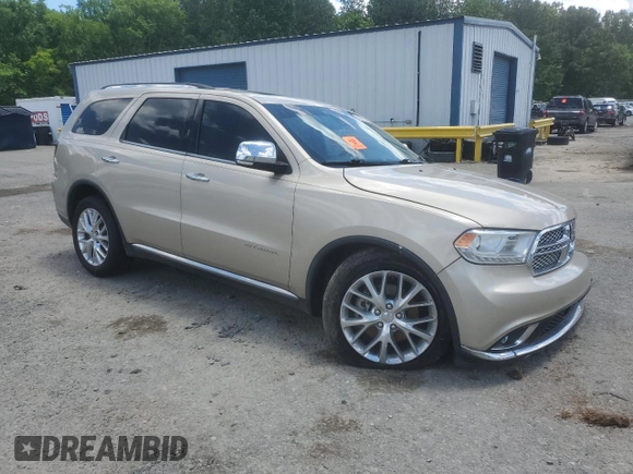 2015 Dodge Durango Citadel with VIN 1C4SDHET0FC873740, listed as a Copart auction lot 56067255 with 131,362 mi miles and Salvage title. Bid and sale history available at DreamBid. Image 4.