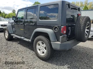 2013 Jeep Wrangler Unlimited Sport z VIN 1C4HJWDG2DL698061, wystawiony jako Copart lot #57823945 z przebiegiem 144 558 mil mil oraz Czysty tytuł • Clean title. Historia ofert i sprzedaży dostępna na DreamBid. Obrazek 2.