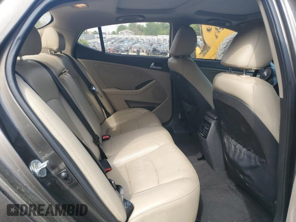 2014 Kia Optima EX z VIN 5XXGN4A76EG337099, wystawiony jako Copart lot #54508445 z przebiegiem 317 116 mil mil oraz Czysty tytuł • Clean title. Historia ofert i sprzedaży dostępna na DreamBid. Obrazek 10.