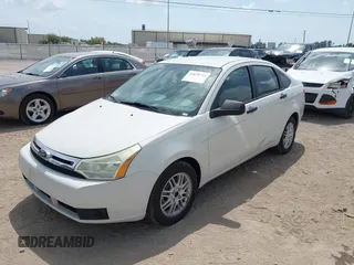 2009 Ford Focus SE with VIN 1FAHP35NX9W203482, listed as a IAAI auction lot 41870714 with 184,823 mi miles. Bid and sale history available at carsss.com. Image 2.