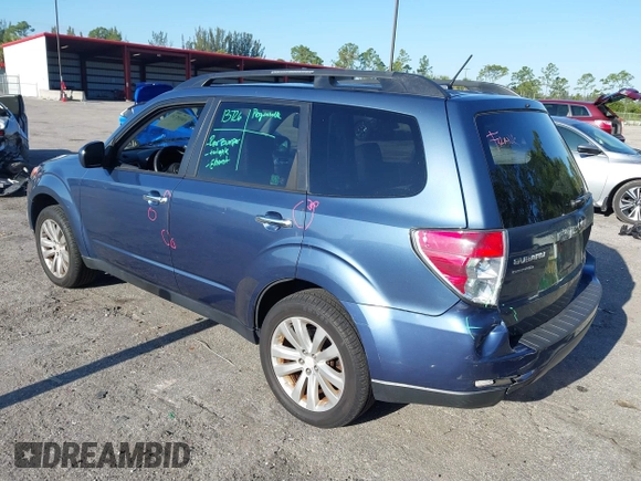 2011 Subaru Forester 2.5X Limited with VIN JF2SHAEC1BH754640, listed as a IAAI auction lot 42018735 with 130,780 mi miles. Bid and sale history available at carsss.com. Image 3.