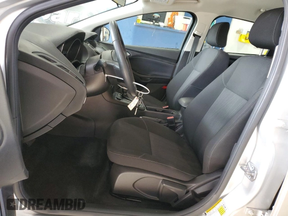 2018 Ford Focus SE with VIN 1FADP3F23JL214008, listed as a Copart auction lot 59692045 with 57,247 mi miles and Salvage title. Bid and sale history available at DreamBid. Image 7.