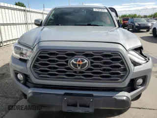 2020 Toyota Tacoma SR5 with VIN 3TMDZ5BN6LM097302, listed as a Copart auction lot 57503895 with 77,212 mi miles and Salvage title. Bid and sale history available at DreamBid. Image 5.