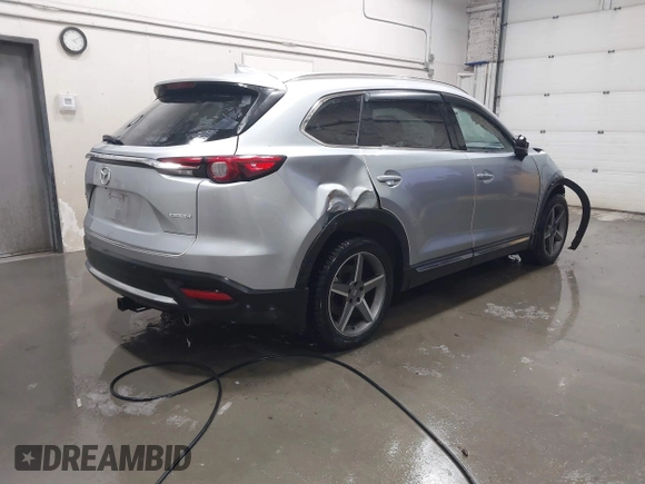 2020 Mazda CX-9 Grand Touring with VIN JM3TCBDY3L0410545, listed as a IAAI auction lot 41195847 with 46,330 mi miles. Bid and sale history available at carsss.com. Image 4.