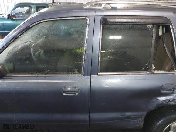 2002 Kia Sportage with VIN KNDJB723X25134499, listed as a IAAI auction lot 41273605 with 1 mi miles. Bid and sale history available at carsss.com. Image 13.