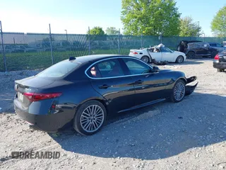 2019 Alfa Romeo Giulia Ti Sport with VIN ZARFAMBN4K7598164, listed as a IAAI auction lot 42146318 with 58,287 mi miles and . Bid and sale history available at DreamBid. Image 4.