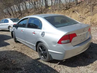 2010 Honda Civic Sdn EX with VIN 19XFA1F84AE035594, listed as a IAAI auction lot 41752445 with 173,264 mi miles. Bid and sale history available at carsss.com. Image 3.