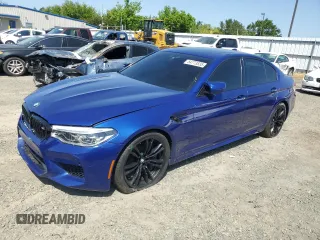 2018 BMW M5 z VIN WBSJF0C51JB282030, wystawiony jako Copart lot #54773835 z przebiegiem 44 046 mil mil oraz Szkody całkowita. Historia ofert i sprzedaży dostępna na DreamBid. Obrazek 1.