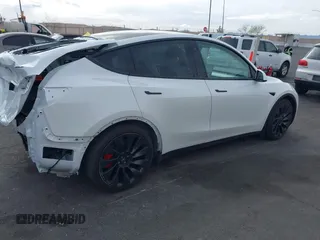 2023 Tesla Model Y Performance with VIN 7SAYGDEFXPF589477, listed as a IAAI auction lot 41936981 with 28,993 mi miles and . Bid and sale history available at DreamBid. Image 21.
