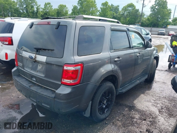 2010 Ford Escape Limited with VIN 1FMCU9E79AKA54071, listed as a IAAI auction lot 42399057 with 117,554 mi miles and . Bid and sale history available at DreamBid. Image 4.