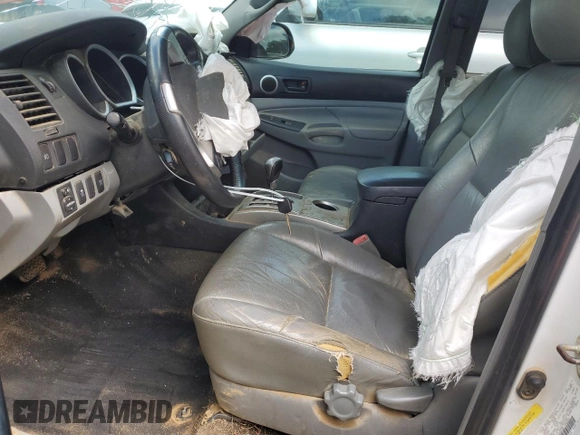 2015 Toyota Tacoma с VIN 5TFLU4EN3FX132165, выставлен на аукционе Copart как лот 62501525 с пробегом 180 887 миль миль и Списание • Salvage title. История ставок и продаж доступна на DreamBid. Изображение 7.