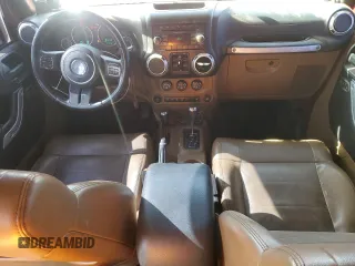 2012 Jeep Wrangler Unlimited Rubicon с VIN 1C4HJWFG6CL109735, выставлен на аукционе Copart как лот 50201085 с пробегом 107 312 миль миль и Списание • Salvage title. История ставок и продаж доступна на DreamBid. Изображение 8.