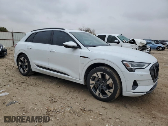 2022 Audi e-tron Premium with VIN WA1AAAGE4NB042461, listed as a Copart auction lot 83235624 with 10,991 mi miles and Salvage title. Bid and sale history available at DreamBid. Image 4.